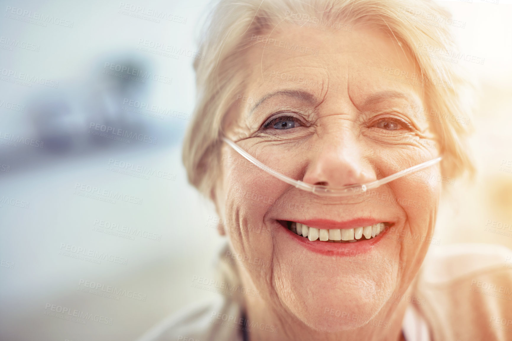 Buy stock photo Portrait, healthcare and recovery with a senior woman in her home after treatment at a hospital or clinic. Face, smile and medical tubes with a happy mature female patient looking healthy closeup