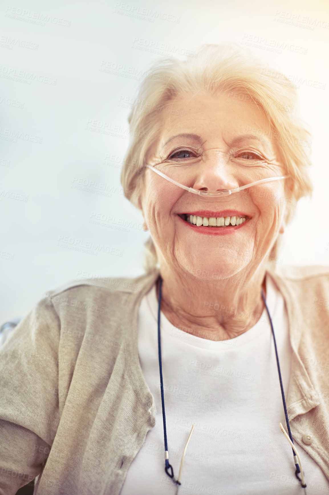 Buy stock photo Cropped portrait of a positive senior woman at home