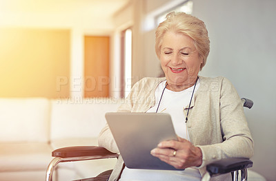 Buy stock photo Happy, wheelchair and senior woman with a tablet, connection and typing with communication. Health, mature female person and elderly lady with recover, rehabilitation and technology for social media