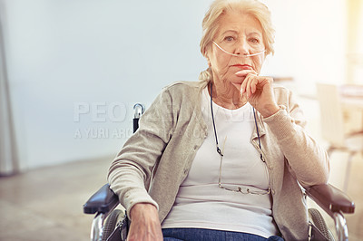 Buy stock photo Cropped portrait of a senior woman sitting in her wheelchair at home