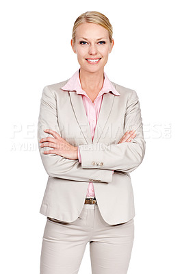 Buy stock photo Studio portrait of a businesswoman standing with her arms folded against a white background