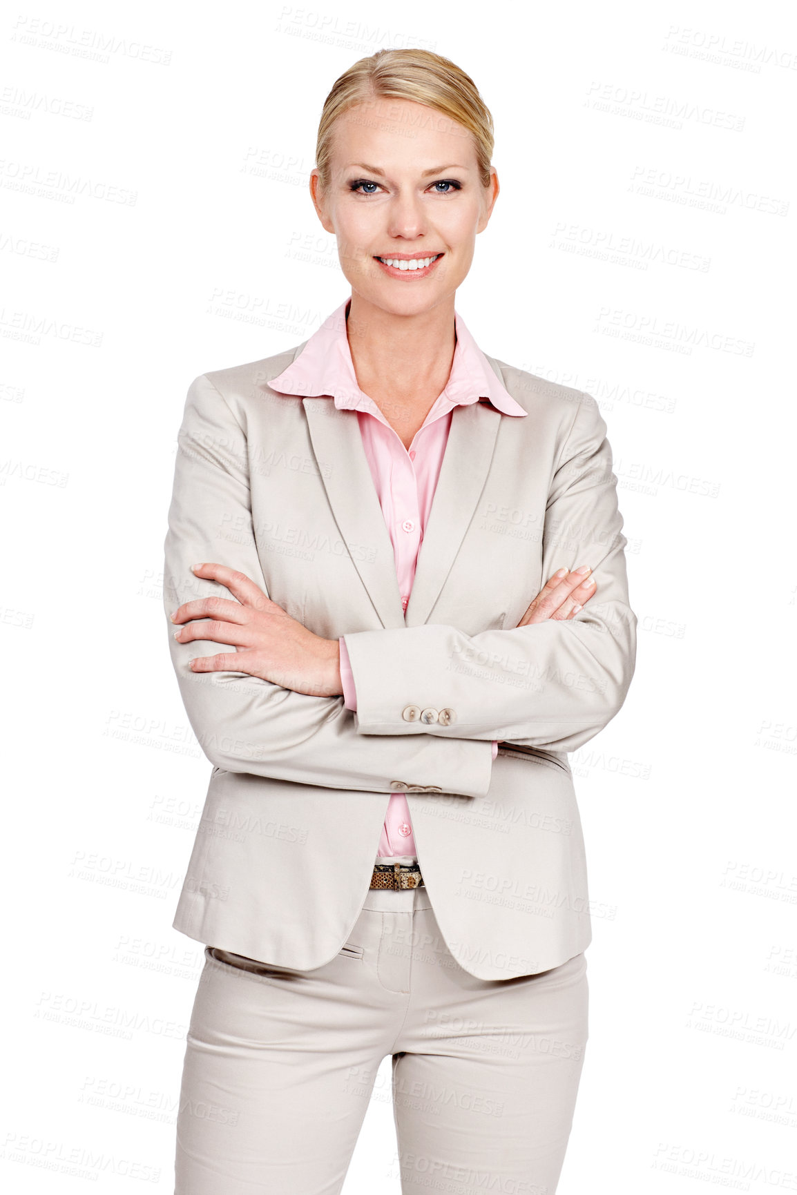 Buy stock photo Studio portrait of a businesswoman standing with her arms folded against a white background