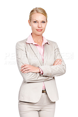 Buy stock photo Studio portrait of a businesswoman standing with her arms folded against a white background