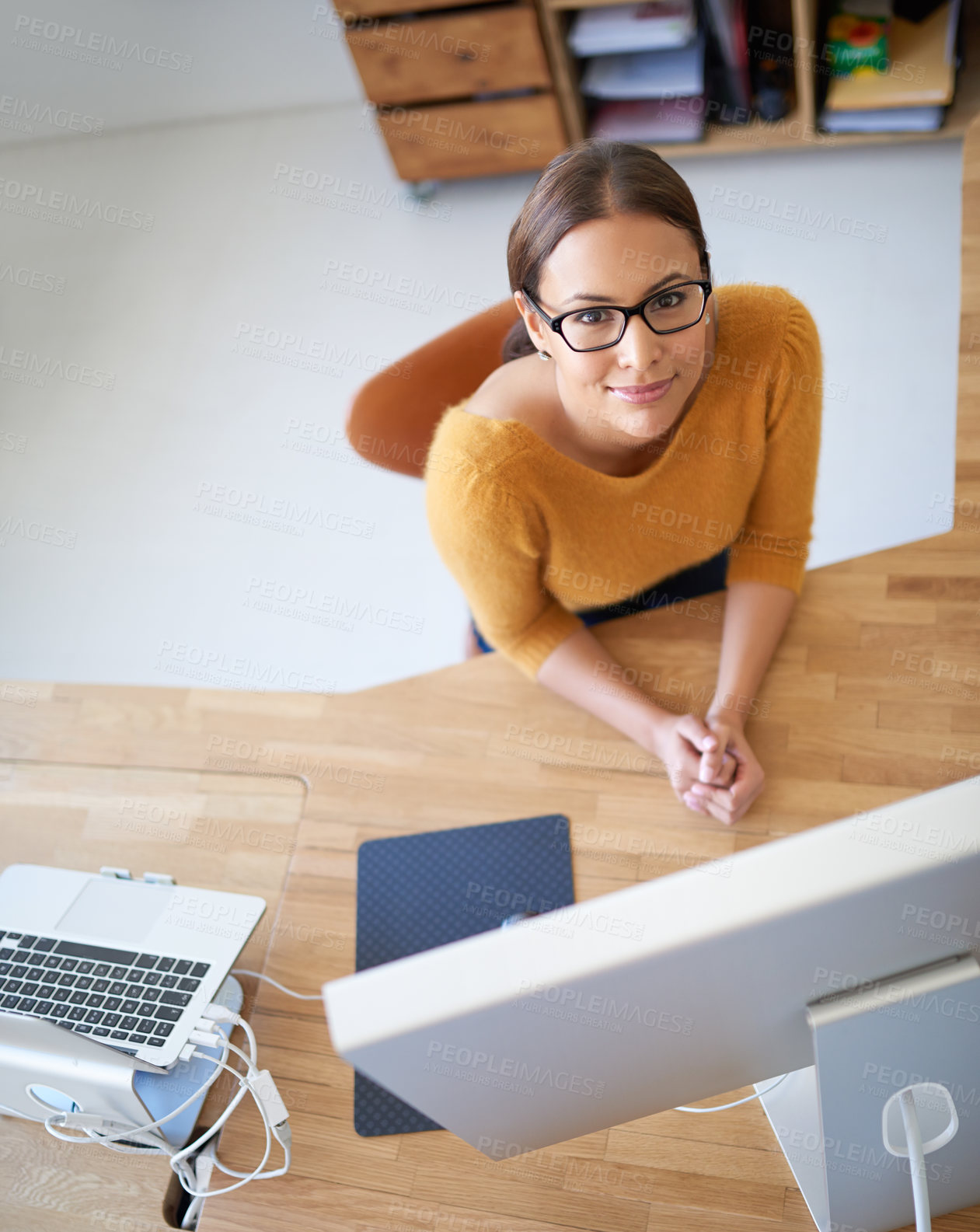 Buy stock photo Above, computer and woman in office with project in creative workplace for web developer or coding. Happy, person and development of company website, app or programmer at desktop for productivity