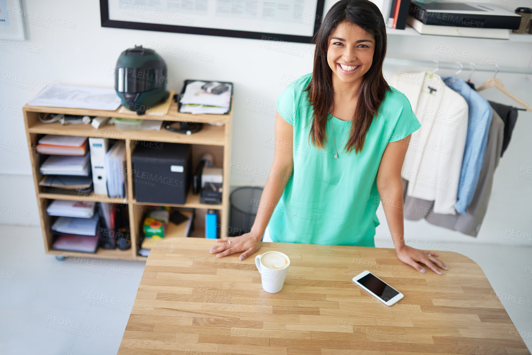 Buy stock photo Portrait of a young female designer at her desk