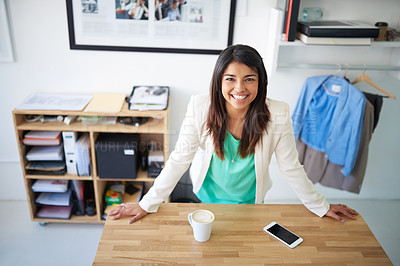 Buy stock photo Portrait of a young female designer at her desk