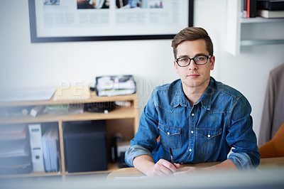 Buy stock photo Portrait of a young male designer at his desk