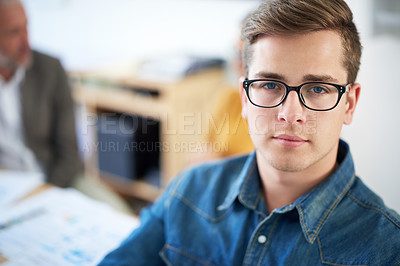 Buy stock photo Cropped portrait of a young businessman in the office