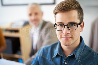 Buy stock photo Cropped portrait of a young businessman in the office