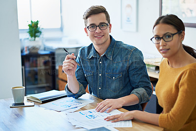 Buy stock photo Portrait of two colleagues working together on a project
