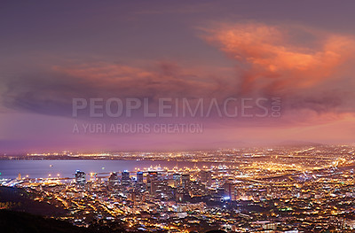 Buy stock photo Night, light and cityscape or clouds and ocean for travel, skyline or urban development. Architecture, skyscraper and hospitality or hotel with horizon or landscape for business and nature or sea