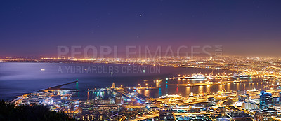 Buy stock photo Landscape, night and skyline or cityscape and sea for travel, lights or urban development. Architecture, skyscraper and hospitality or hotel with horizon or destination for business and buildings 