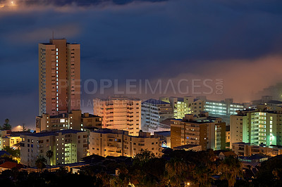 Buy stock photo Clouds, night and buildings of city, urban and architecture of cityscape with nature, outdoor and design. Sky, landscape and plants for development of environment, tall and expansion of Barcelona