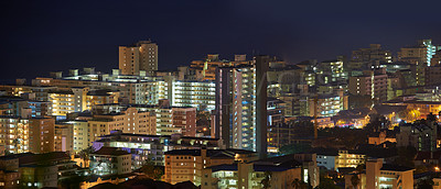 Buy stock photo Sky, night and buildings of city, urban and architecture of cityscape with nature, outdoor and design. Dark, landscape and location for development of environment, tall and expansion of Barcelona