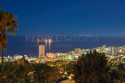 Buy stock photo Cityscape, trees and night or urban landscape with buildings, boat and sea or outdoor. Development, skyline and port or water for shipping, cargo and tourism or travel for architecture or hospitality