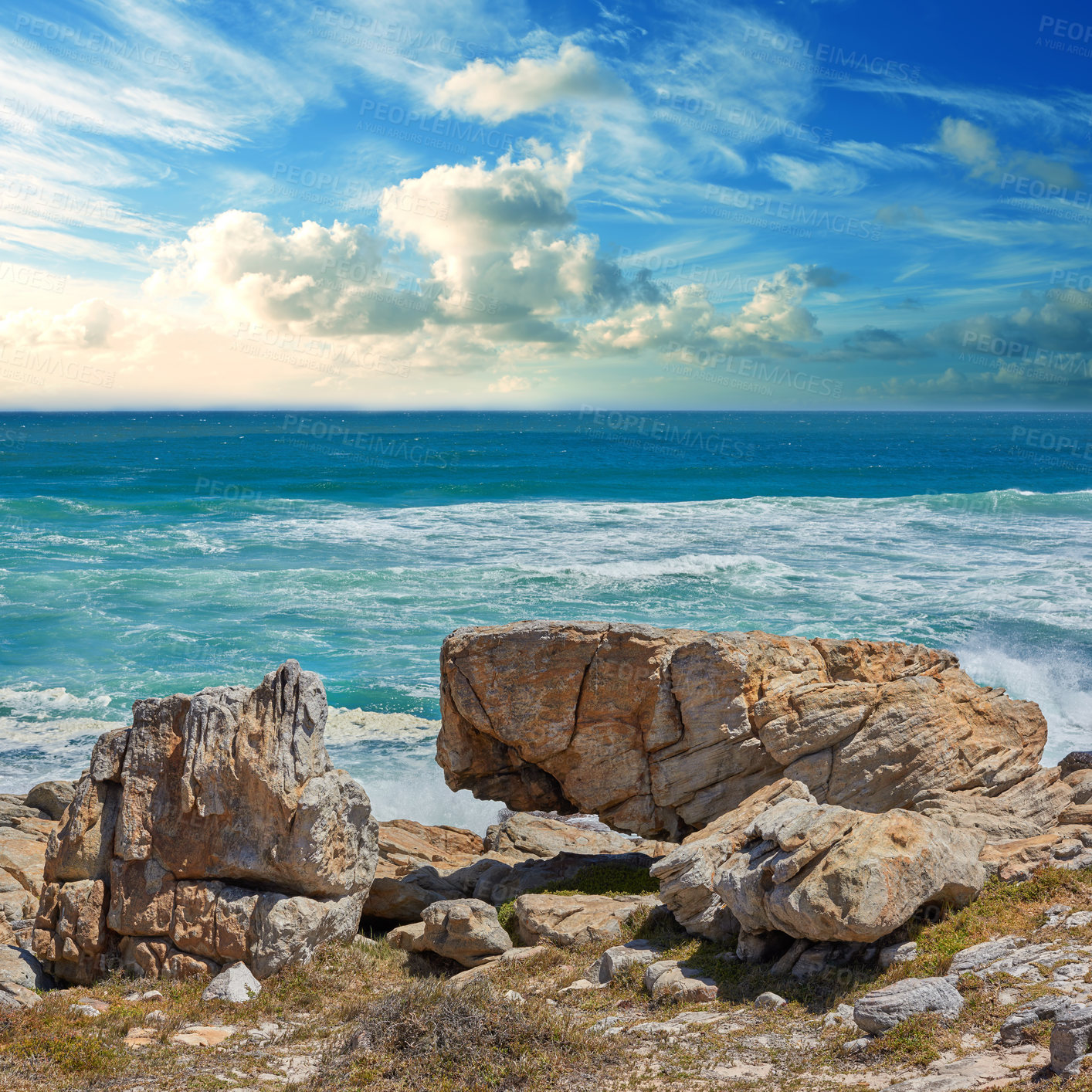 Buy stock photo Rocks, ocean and water in nature outdoor for travel destination, coat environment and natural beauty. Blue sky, beach and scenery for seaside peace, tourism journey with adventure location of view