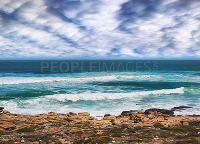 Buy stock photo Ocean, rocks and water in nature outdoor for travel destination, coat environment and natural beauty. Blue sky, beach and scenery for seaside peace, tourism journey with adventure location of view