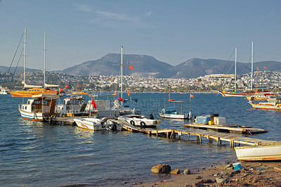 Buy stock photo Ship, harbor and ocean for travel, transportation and cargo with mountains, water and sunshine. Boat, sailing and sea as landscape in New York with sky for international export, delivery and trade