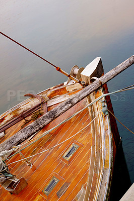 Buy stock photo Boat, wood and water or deck for fishing, travel or business in village or small town. Transportation, sea or ocean and maritime or sailing for industry, shipping and location in nature for adventure