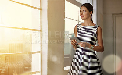 Buy stock photo Cropped shot of a businesswoman using a tablet in her office