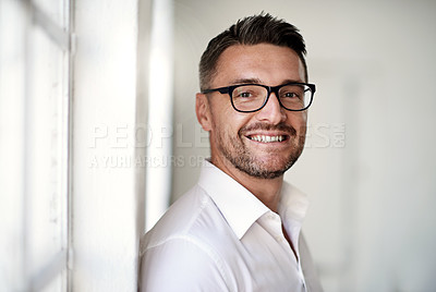 Buy stock photo Cropped portrait of a businessman standing in his office