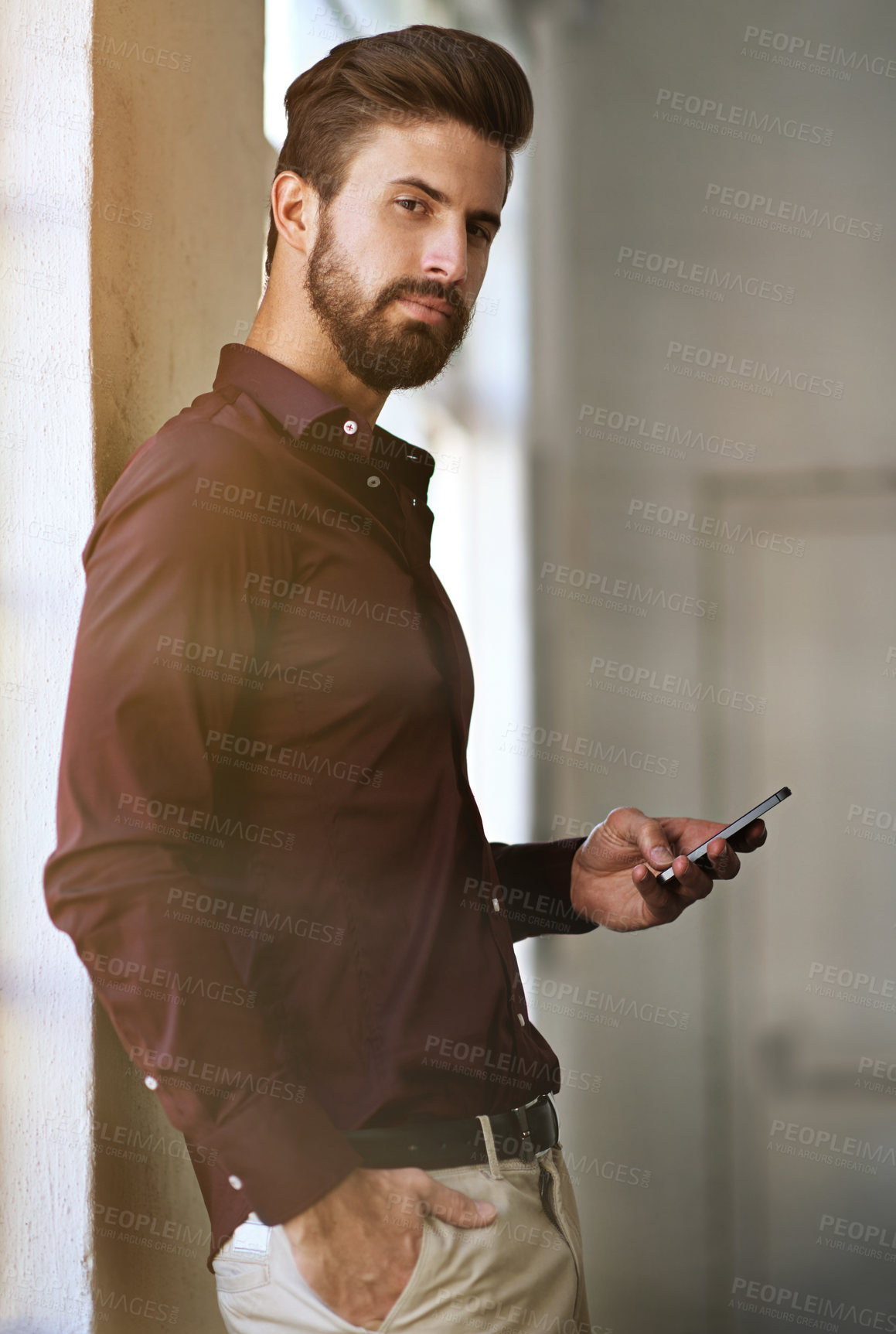 Buy stock photo Creative, man and portrait with smartphone in workplace for client feedback, project updates and timeline for task. Multimedia designer, mobile phone and online for content approval and objectives.