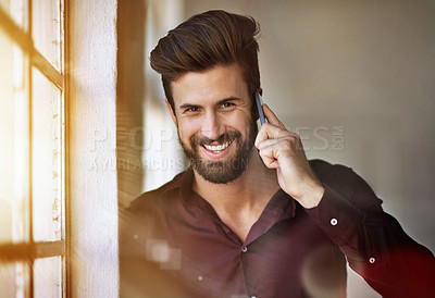 Buy stock photo Cropped portrait of a businessman making a call in his office