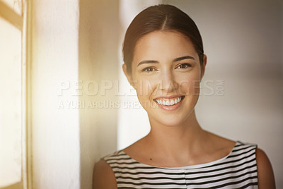 Buy stock photo Window, portrait and business woman in office for confidence, job opportunity or career growth. Lens flare, professional and employee with smile for ambition, happiness or internship at media agency