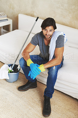 Buy stock photo Portrait of a young man cleaning the house
