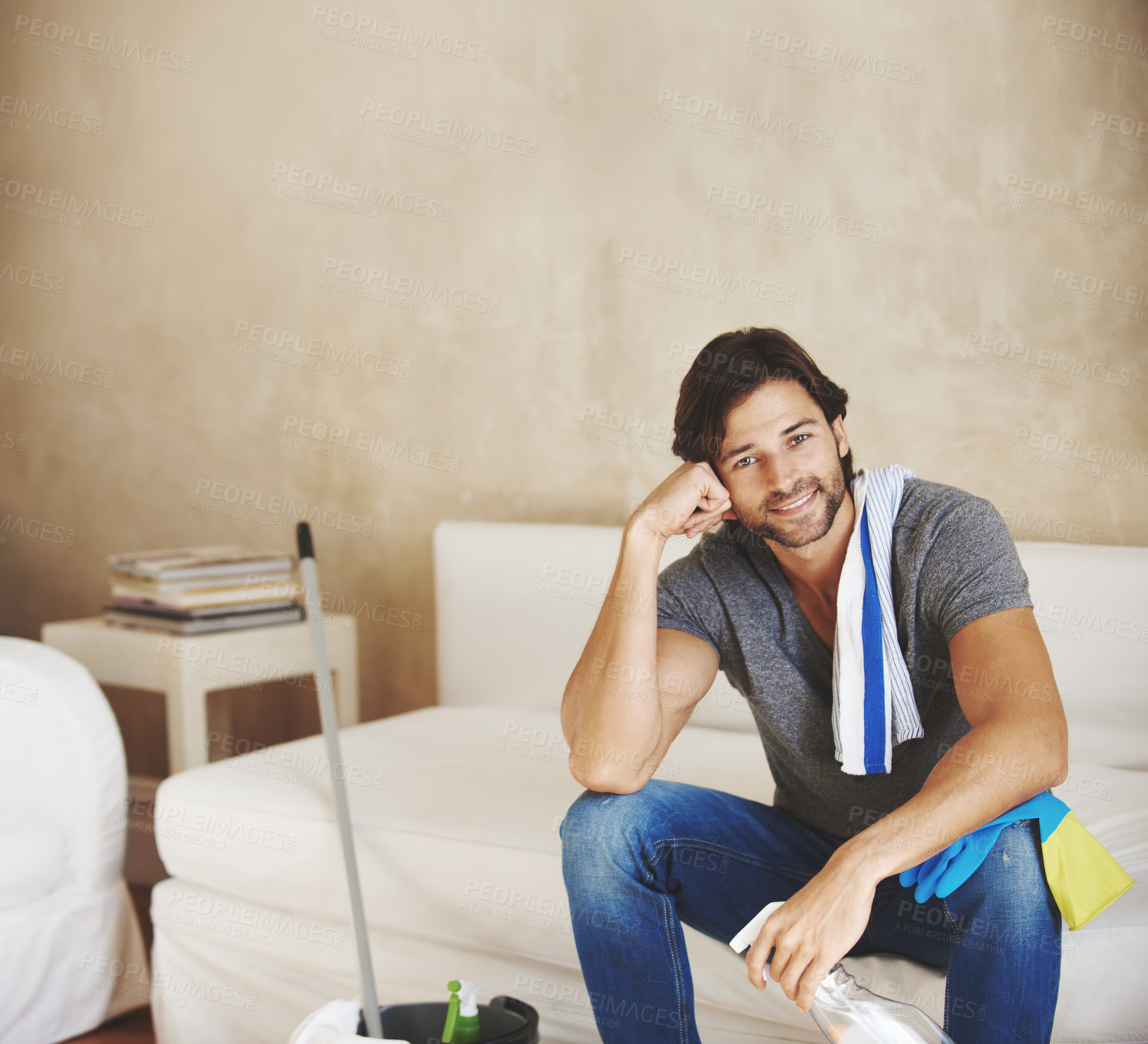 Buy stock photo Portrait of a young man cleaning the house