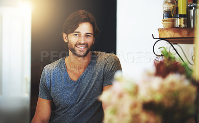 Buy stock photo A handsome young man at home