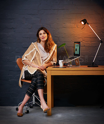 Buy stock photo Portrait of a woman sitting at a desk with her laptop