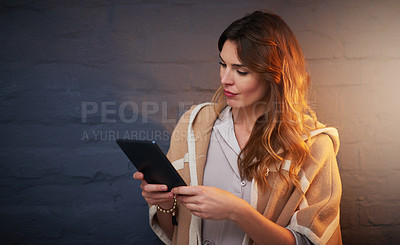 Buy stock photo Woman, tablet and hands with focus on backdrop for secret shopping, online or connected and browsing. Female person and wall or gradient with technology, buying or digital purchase with internet