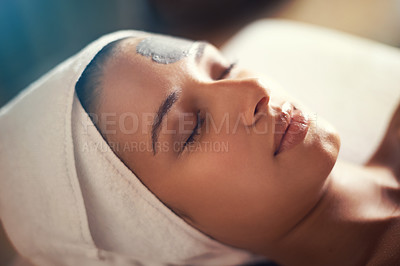 Buy stock photo Woman, relax and wellness in spa for clay mask, therapy and cosmetic treatment with eyes closed for break and skincare. Young person with towel on head for peace, holistic and hygiene care for beauty