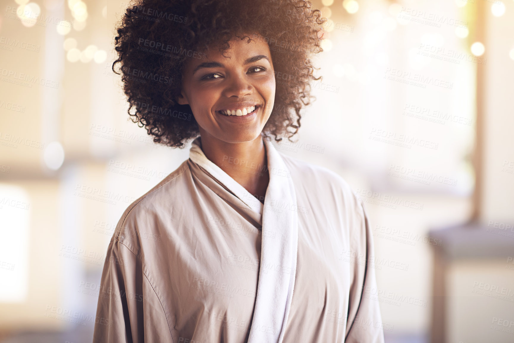 Buy stock photo Spa, woman and portrait with smile in a bathrobe for wellness, cosmetics and beauty treatment. Health, skincare and resort with a relax African female person ready for dermatology at a hotel 