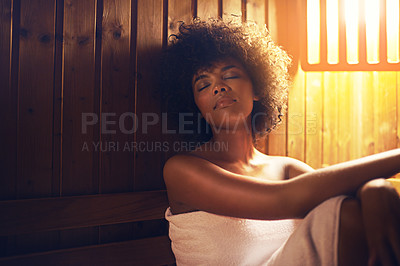 Buy stock photo A young woman relaxing in the sauna at a spa
