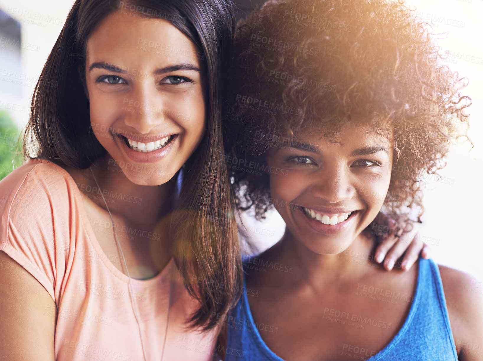 Buy stock photo Shot of two girlfriends hanging out together