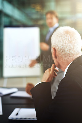 Buy stock photo Cropped shot of a businessman giving a presentation