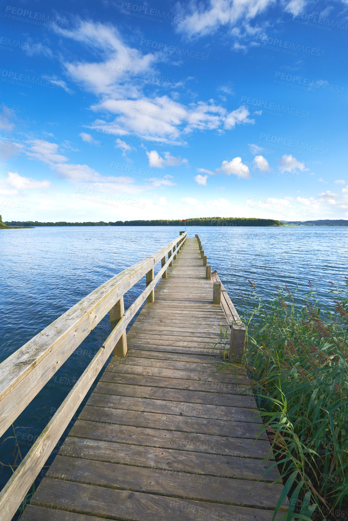 Buy stock photo Lake, bridge and blue sky in nature and clouds, water or landscape with outdoor plants. Wood, platform or river in countryside or adventure and structure or path for journey and travel for holiday  