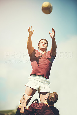Buy stock photo Rugby, sports and teamwork and man and ball on field for training, health and stadium practice. Challenge, competition and performance with male person in outdoor pitch for exercise, game and workout