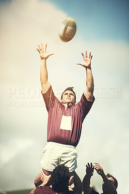 Buy stock photo Rugby, sports and ball with man on field for training, health and stadium practice. Challenge, competition and athlete performance with male person in outdoor pitch for exercise, games and workout