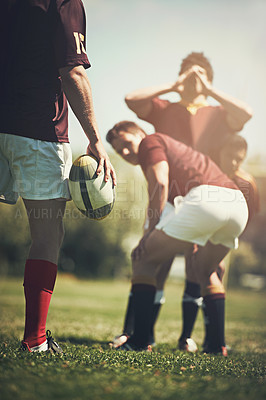 Buy stock photo Rugby, start and fitness men with ball on a field with huddle, scrum and pitch, training and power outdoor. Energy, handball and sports team at a park for competition, action or performance challenge