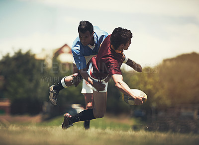 Buy stock photo Rugby, tackle and fitness men on a field for sports, ball or action, game or power outdoor. Jump, handball and male team at a park for competitive, training or energy, workout or active challenge