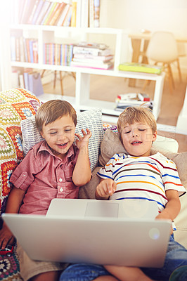 Buy stock photo Children, laptop and siblings on a sofa with cartoon, film or streaming movie at home. Computer, learning and boy kids in a house for google it, search or ebook storytelling, app or Netflix and chill