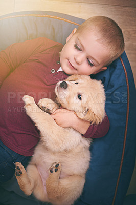 Buy stock photo Child, dog and hug with home, floor and pet with love and care at house. Kid, puppy and golden retriever or sleepy labrador with embrace, bonding and together with high angle of animals or pets
