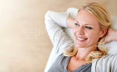 Buy stock photo Shot of a woman relaxing at home