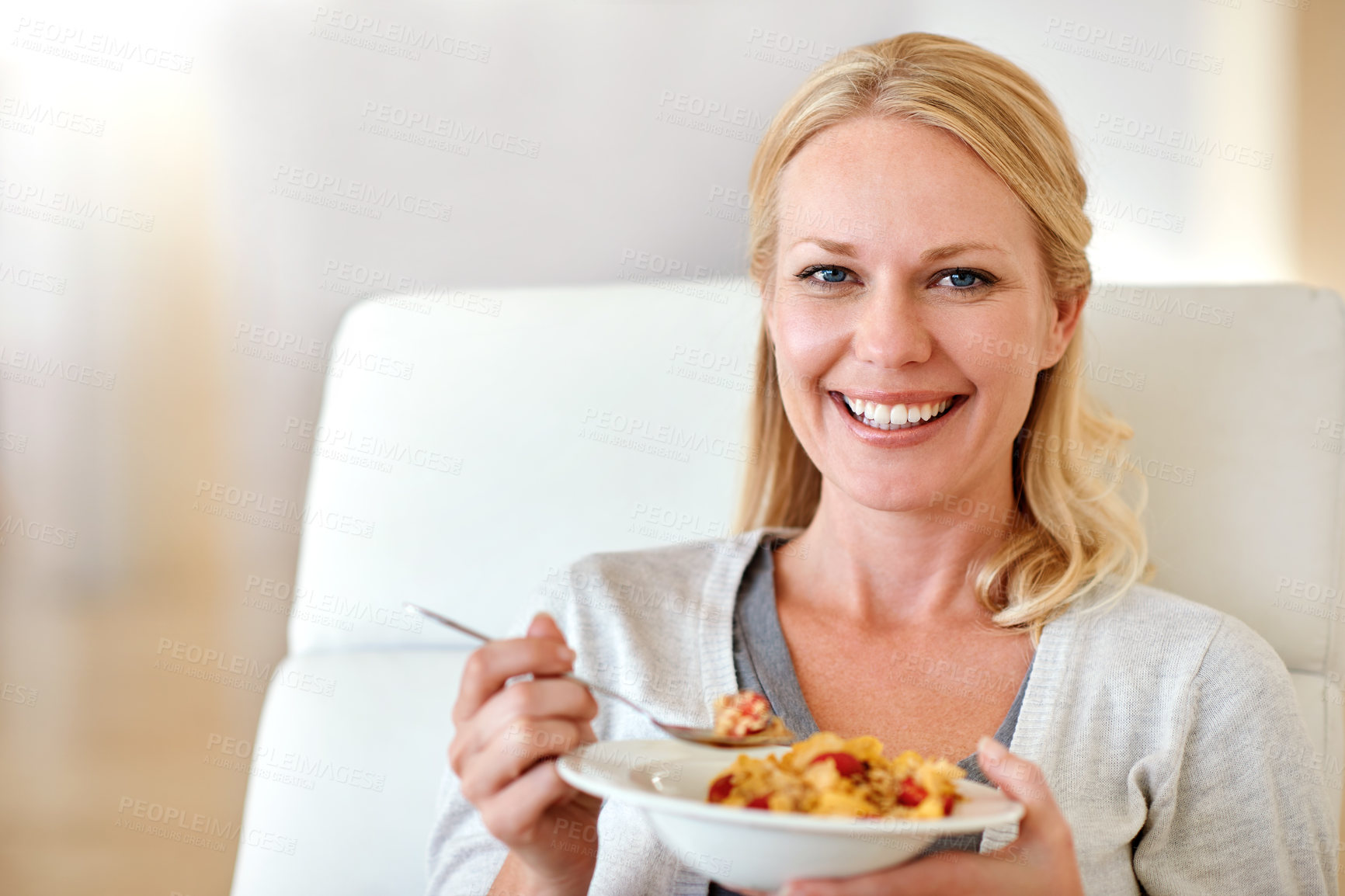 Buy stock photo Happy woman, portrait smile and cereal for healthy breakfast, meal or morning diet in living room at home. Female person smiling with food bowl of wheat or corn flakes for health, nutrition or fiber