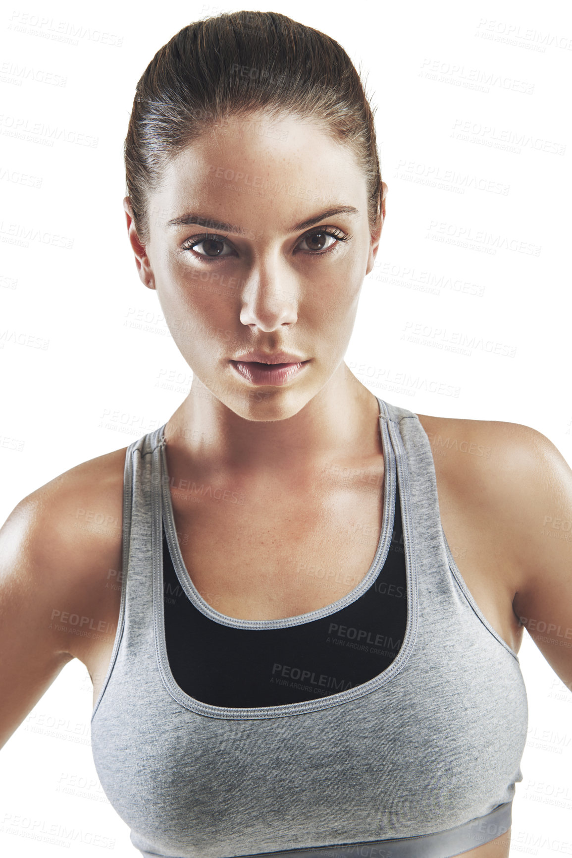 Buy stock photo Cropped portrait of a young female athlete against white background