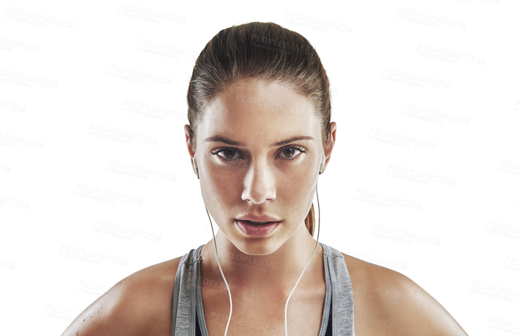 Buy stock photo Cropped portrait of a young female athlete listening to music against white background