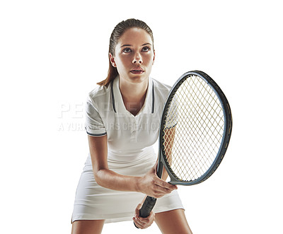 Buy stock photo Studio shot of a female tennis player holding a racket against a white background